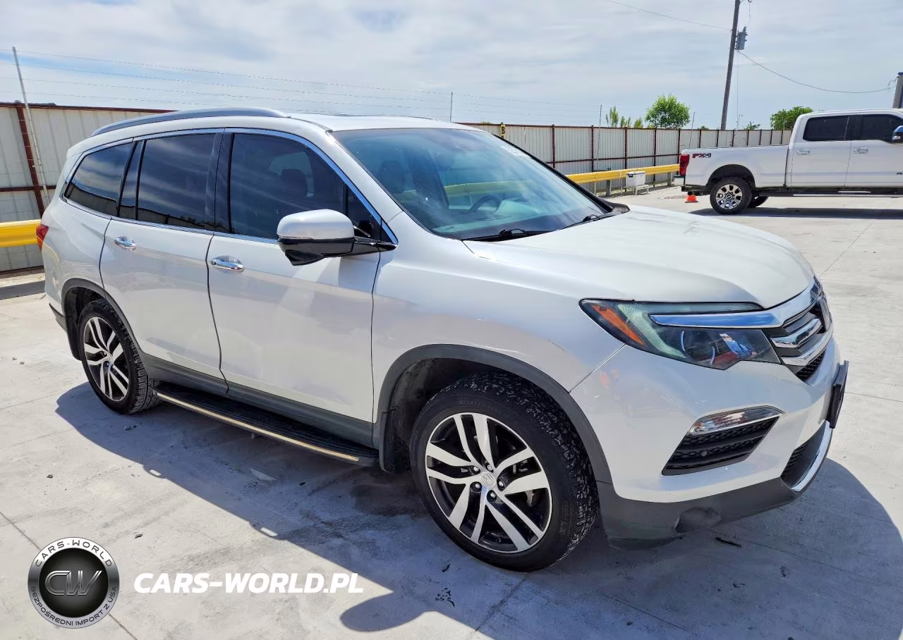 2018 Honda Pilot Touring VIN:5FNYF5H98JB013552 - 4