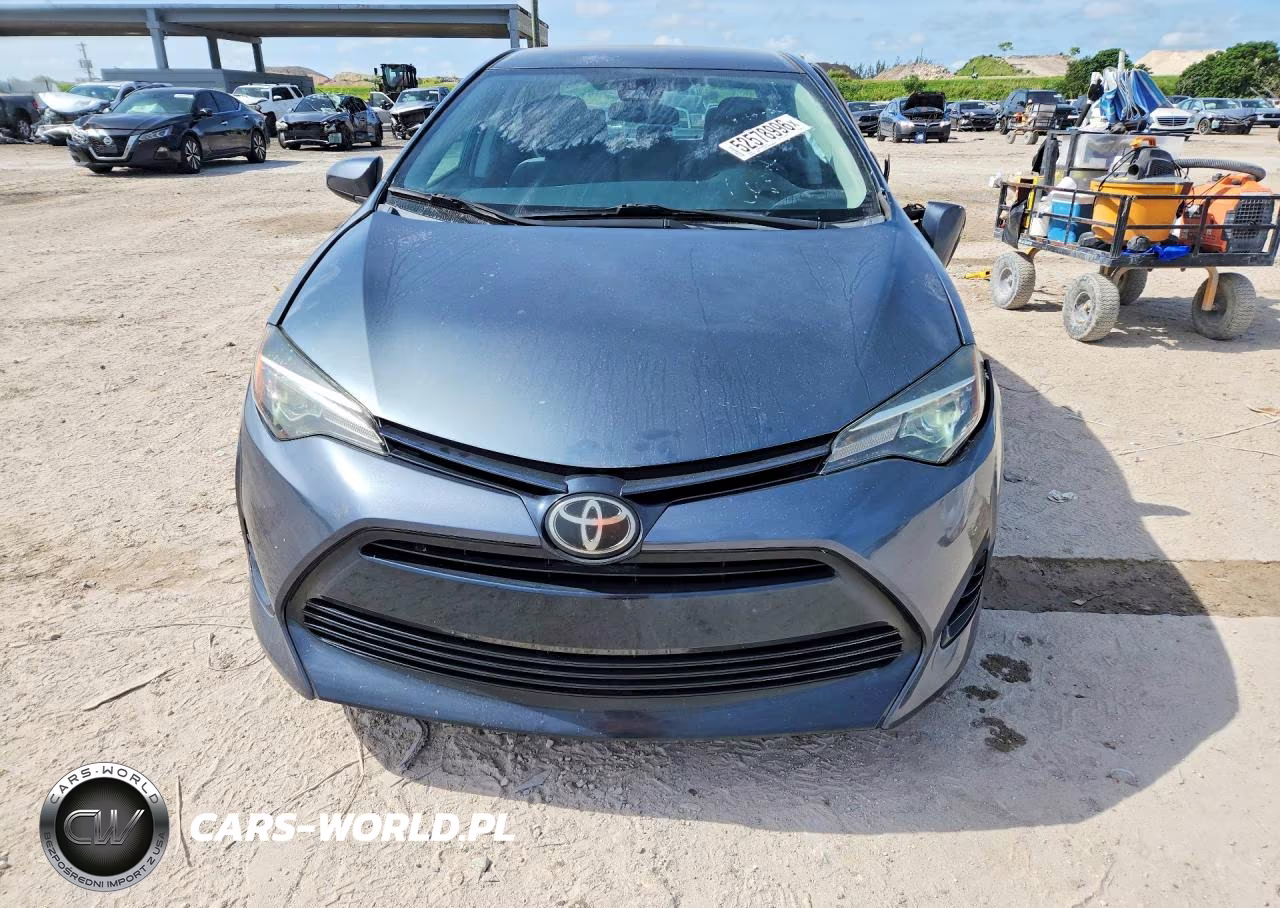 2018 Toyota Corolla L VIN:5YFBURHE9JP798622 - 5