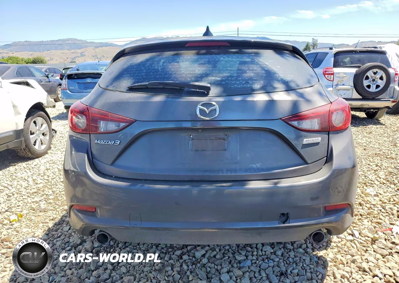 2018 Mazda 3 Touring VIN:3MZBN1L39JM256381 - 6