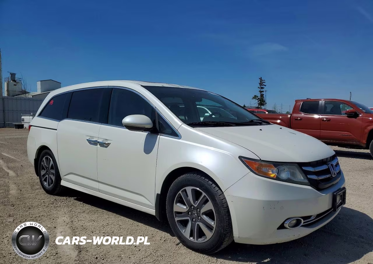 2014 Honda Odyssey Touring VIN:5FNRL5H9XEB040092 - 4
