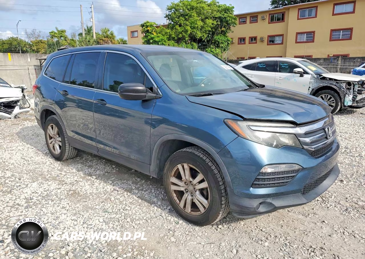 2018 Honda Pilot Lx VIN:5FNYF5H19JB005339 - 4