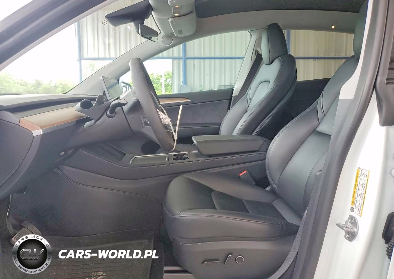 2023 Tesla Model Y VIN:7SAYGDEE8PA083117 - 7