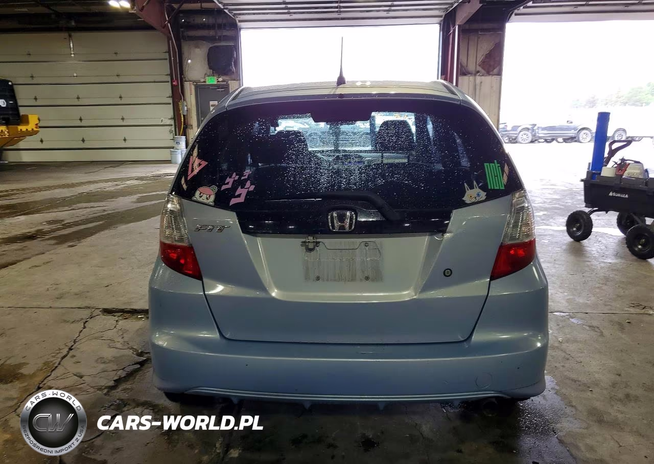 2009 Honda Fit VIN:JHMGE88239C004204 - 6
