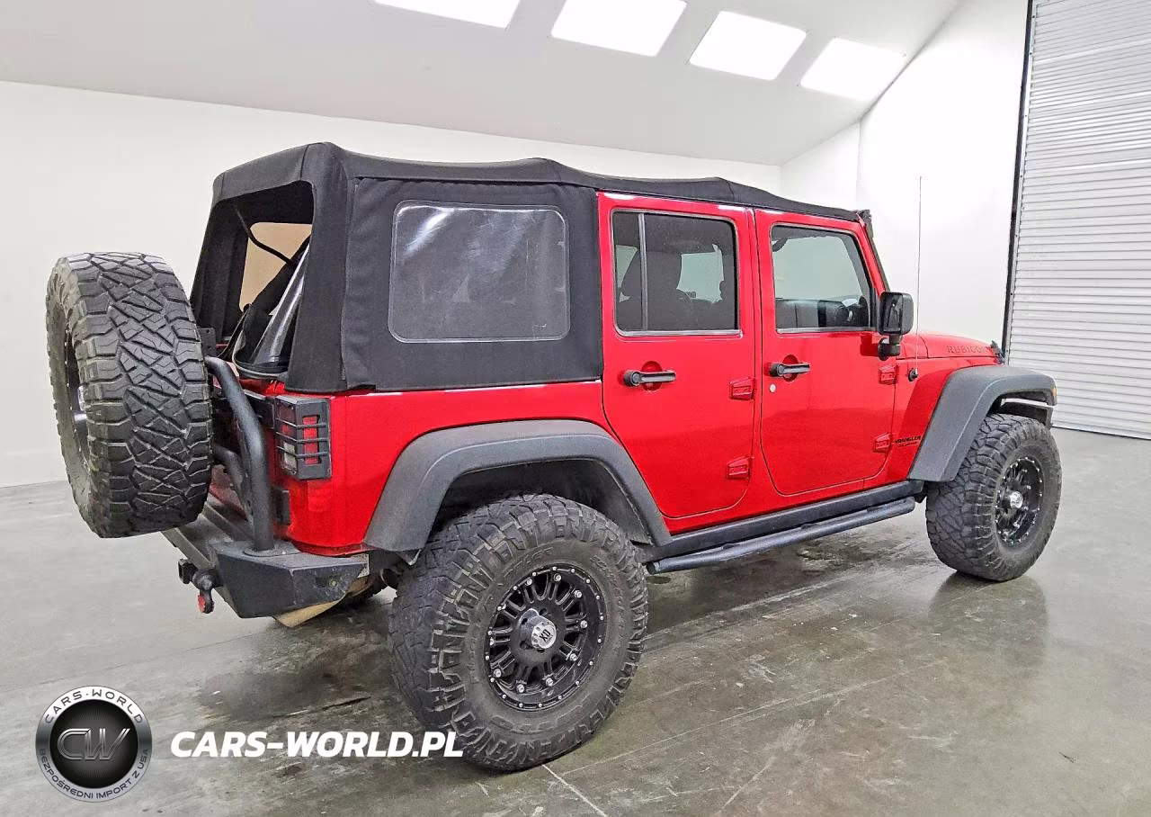 2014 Jeep Wrangler Unlimited Rubicon VIN:1C4HJWFG8EL118357 - 3