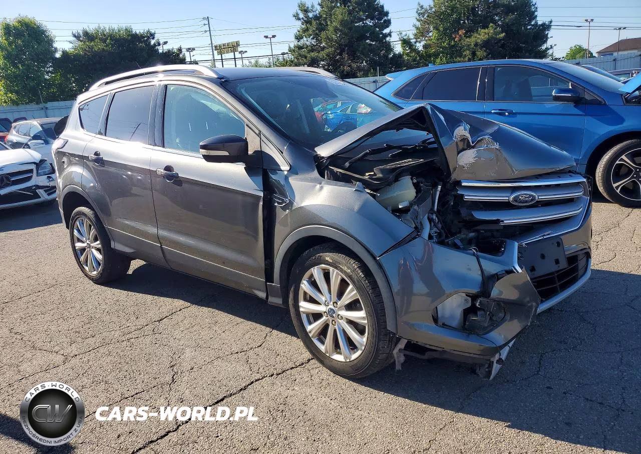 2017 Ford Escape Titanium VIN:1FMCU0JDXHUA31517 - 4