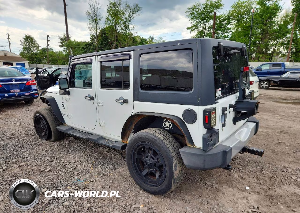 2011 Jeep Wrangler Unlimited Sahara VIN:1J4BA5H12BL588592 - 2