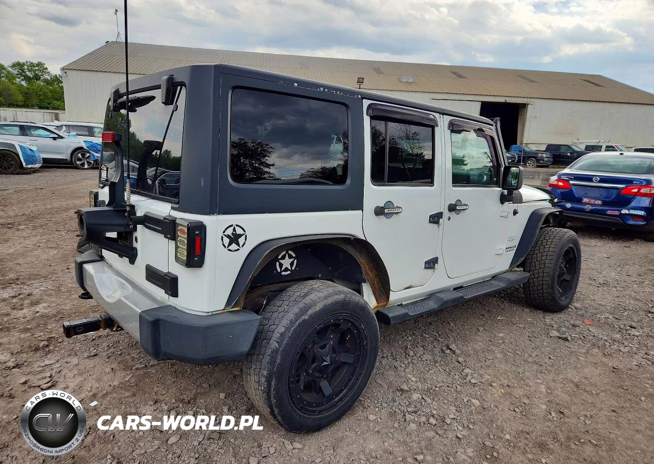 2011 Jeep Wrangler Unlimited Sahara VIN:1J4BA5H12BL588592 - 3