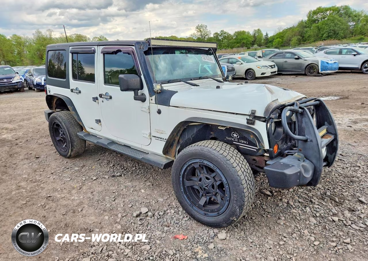 2011 Jeep Wrangler Unlimited Sahara VIN:1J4BA5H12BL588592 - 4
