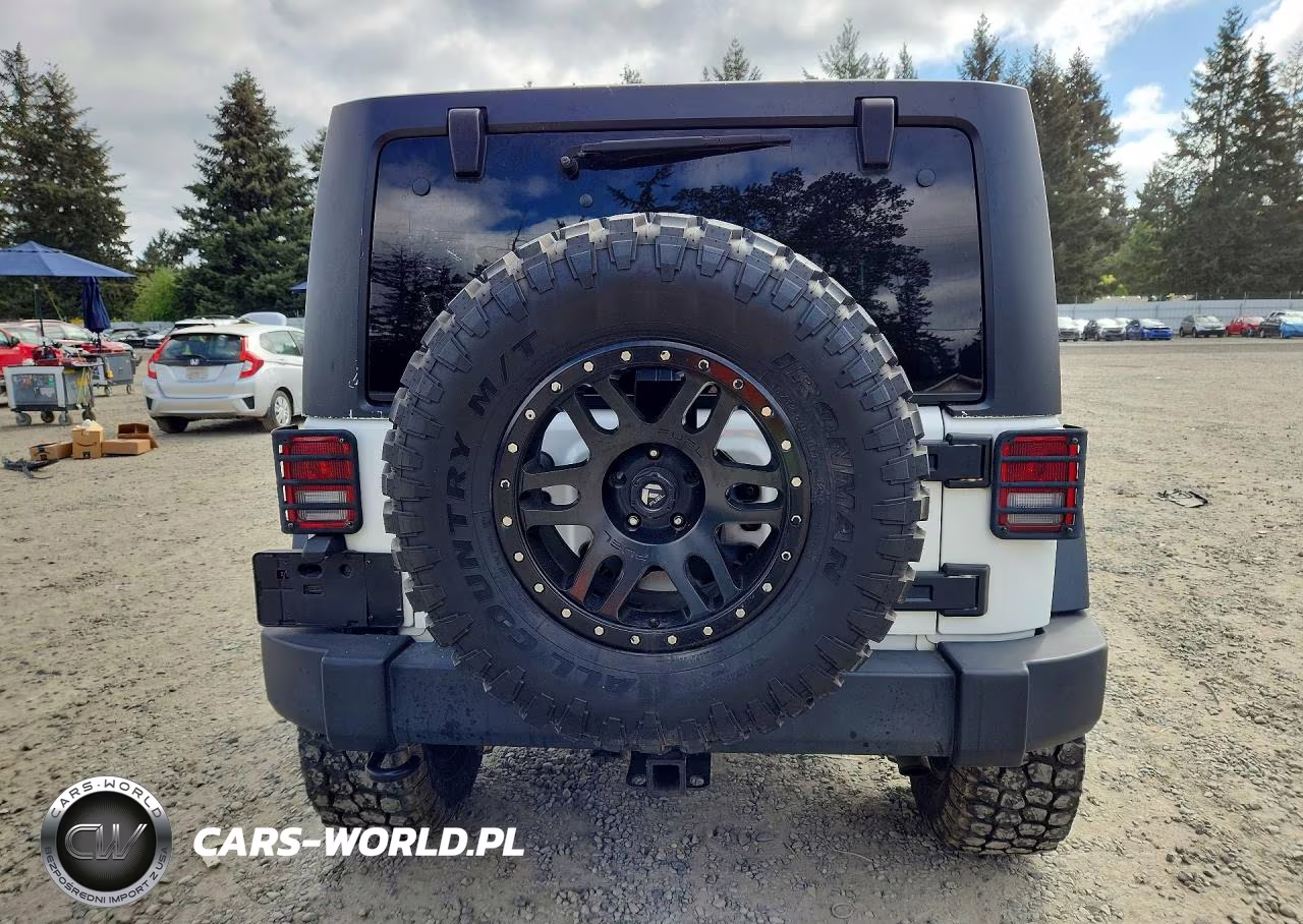 2014 Jeep Wrangler Unlimited Sport VIN:1C4BJWDG5EL145797 - 6