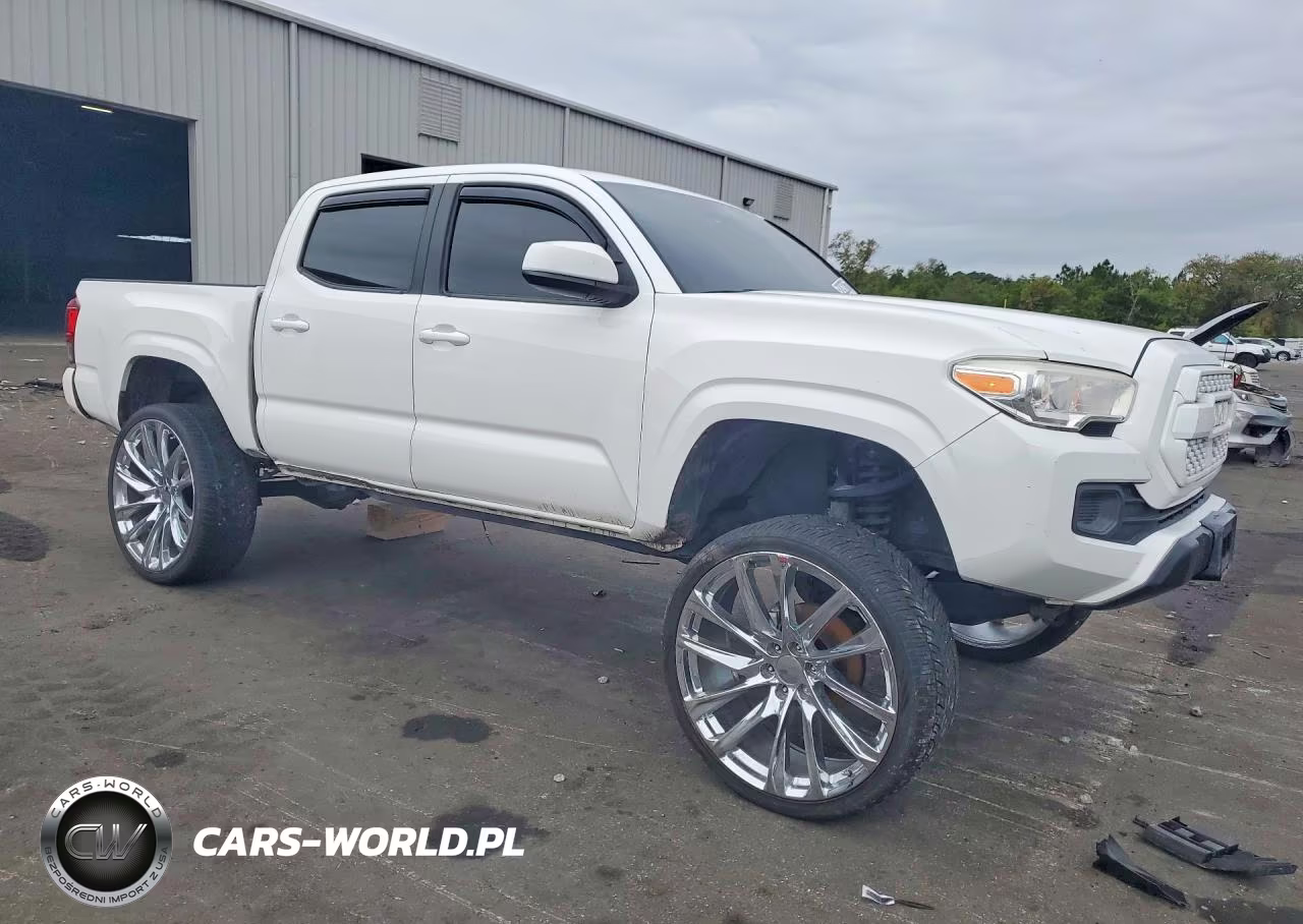 2018 Toyota Tacoma Sr VIN:5TFAX5GN1JX127704 - 4