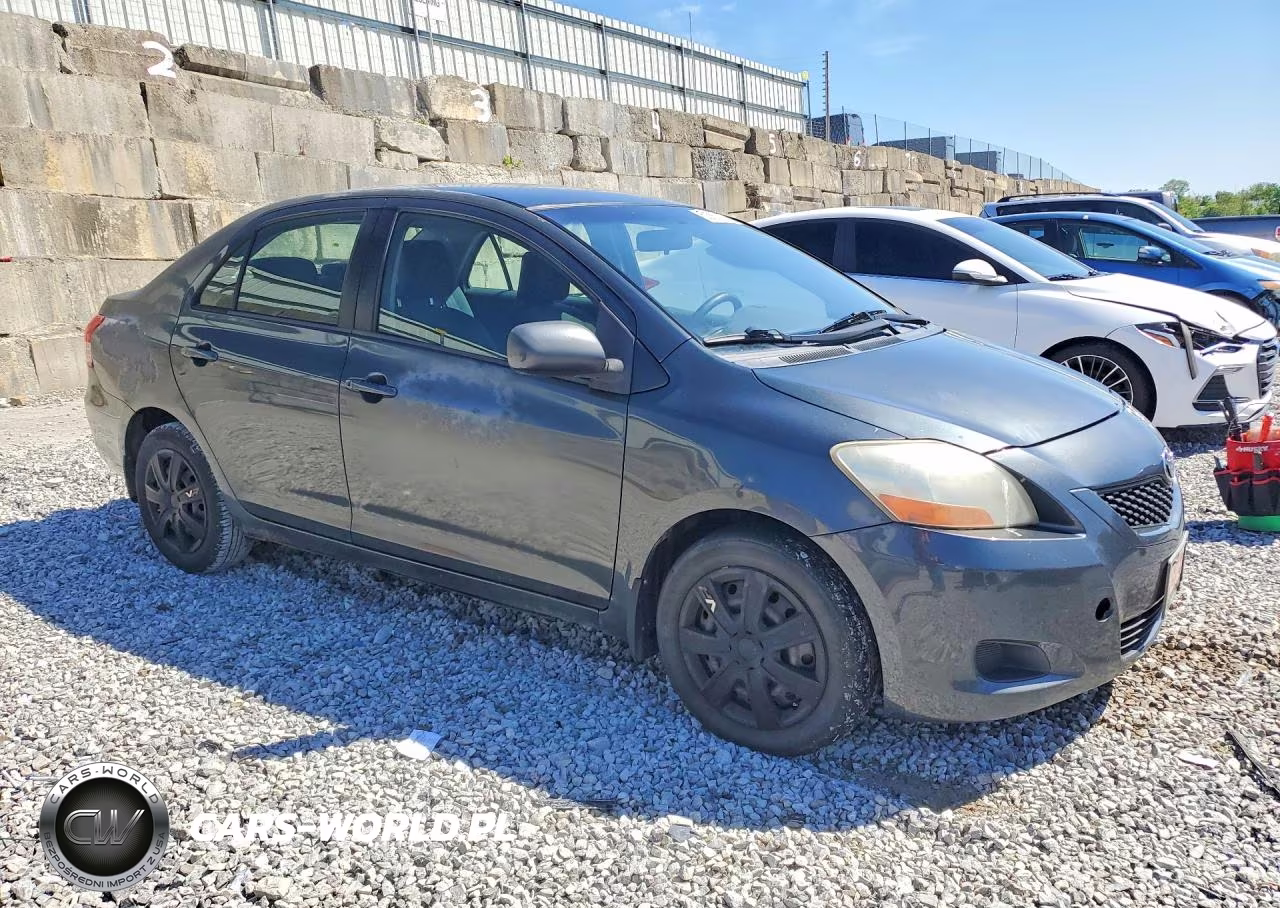 2009 Toyota Yaris Base VIN:JTDBT903091323731 - 4