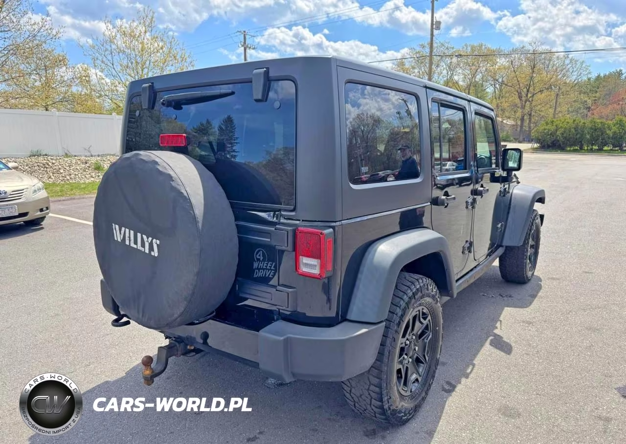 2015 Jeep Wrangler Unlimited Sport VIN:1C4BJWDG9FL542754 - 3