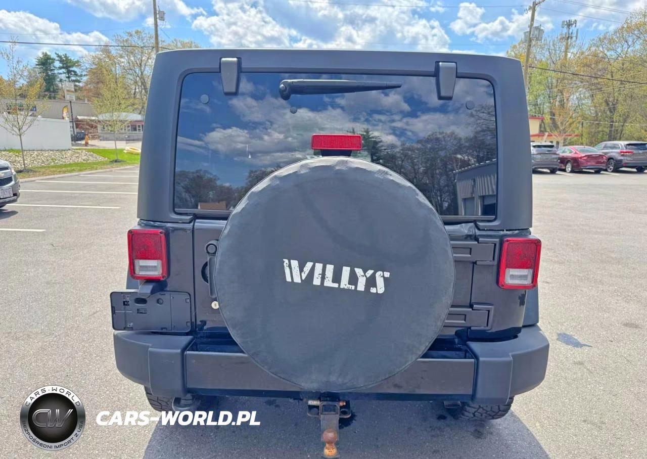 2015 Jeep Wrangler Unlimited Sport VIN:1C4BJWDG9FL542754 - 9