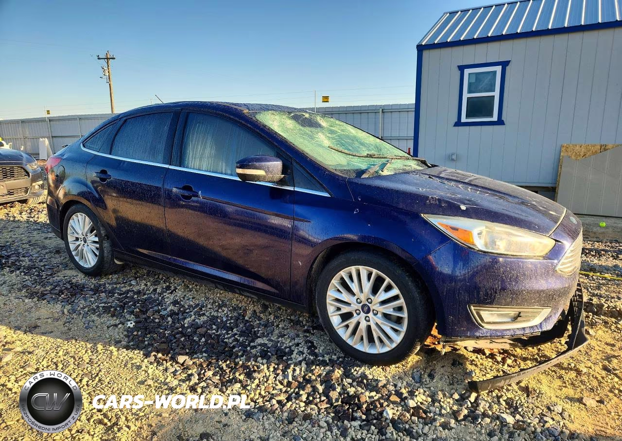2017 Ford Focus Titanium VIN:1FADP3J27HL268557 - 4