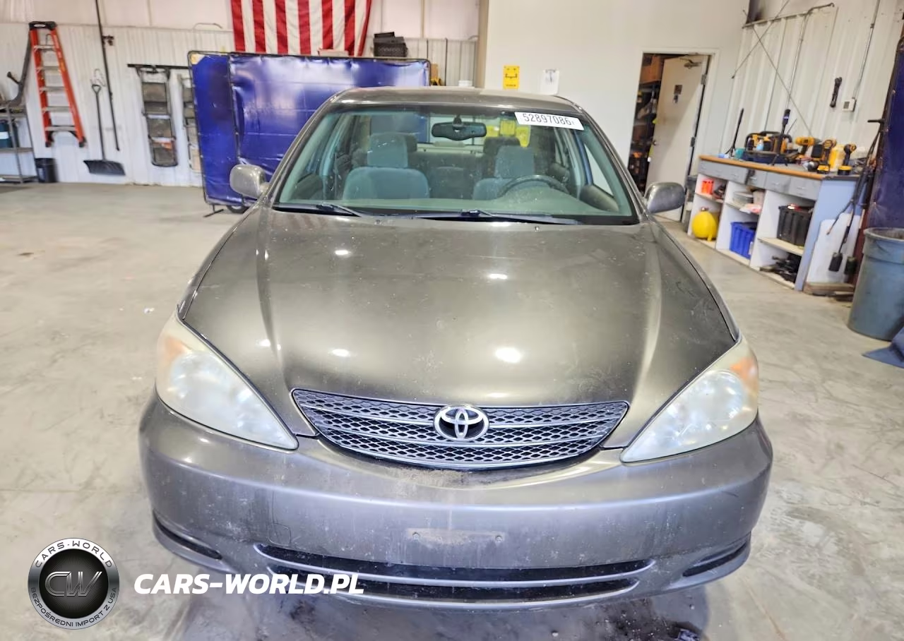 2002 Toyota Camry Le VIN:JTDBE32K820054305 - 5