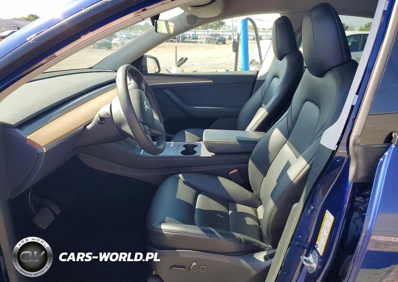 2023 Tesla Model Y VIN:7SAYGDEE9PA046562 - 7