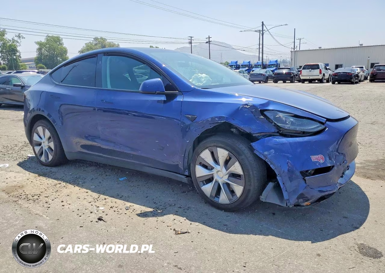2023 Tesla Model Y VIN:7SAYGAEE3PF903928 - 4