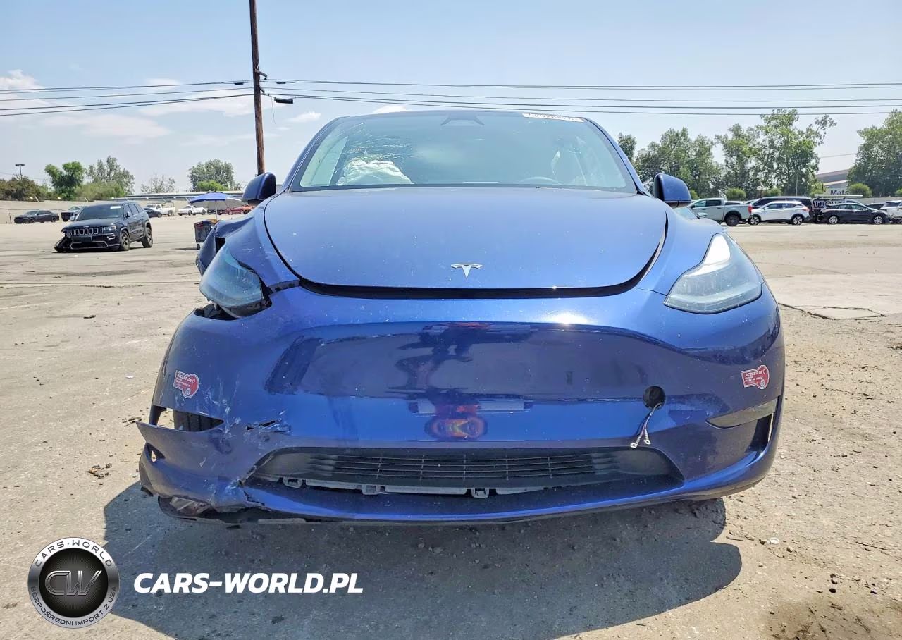 2023 Tesla Model Y VIN:7SAYGAEE3PF903928 - 5