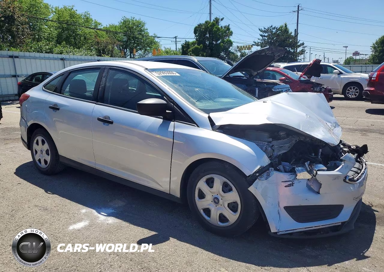 2017 Ford Focus S VIN:1FADP3E27HL332073 - 4