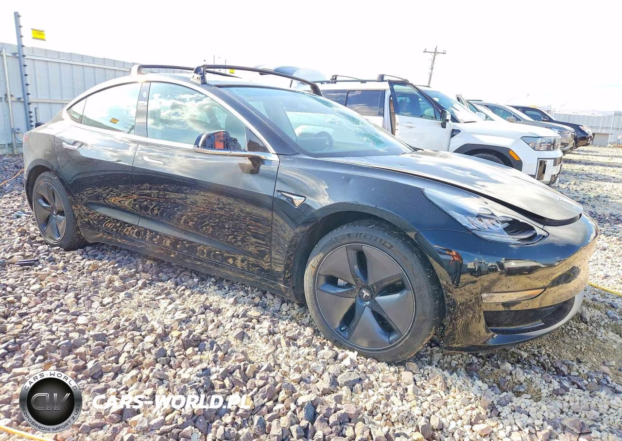 2018 Tesla Model 3 VIN:5YJ3E1EBXJF182209 - 4
