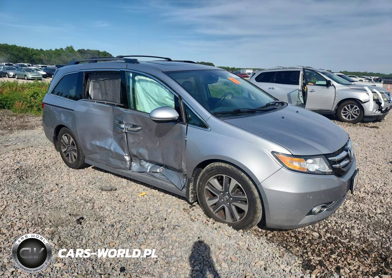 2016 Honda Odyssey Touring VIN:5FNRL5H90GB097730 - 4