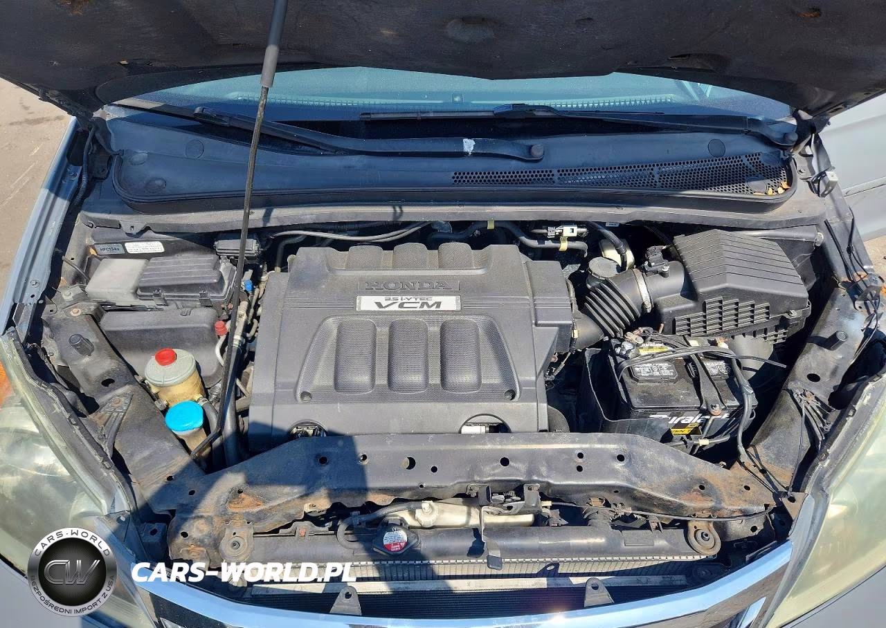 2010 Honda Odyssey Touring VIN:5FNRL3H85AB502497 - 12