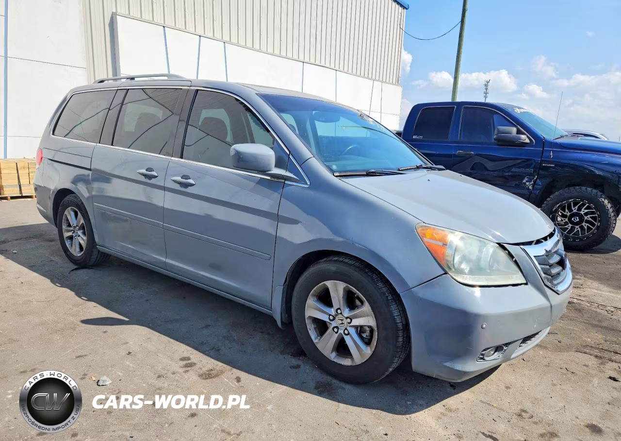 2010 Honda Odyssey Touring VIN:5FNRL3H85AB502497 - 4