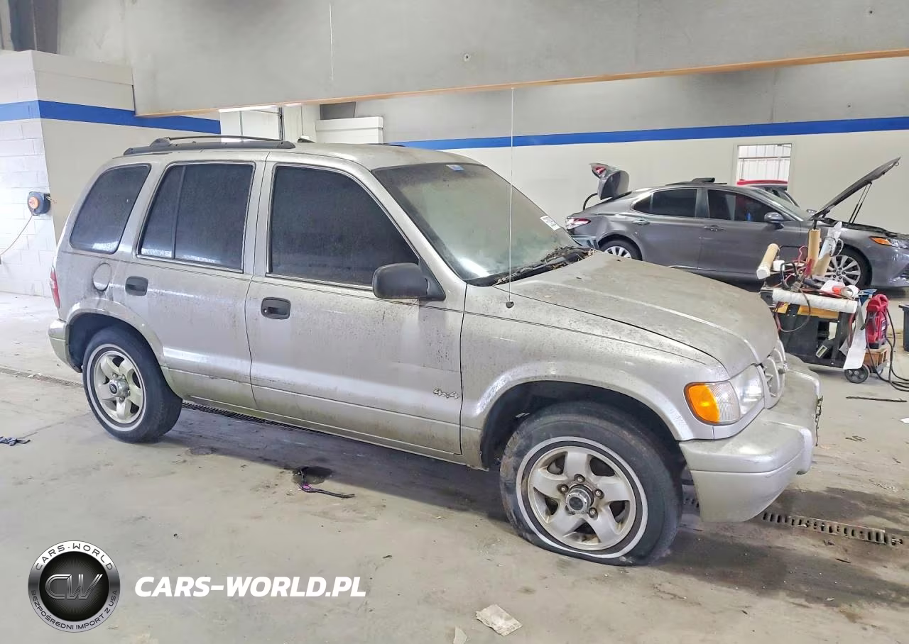 2000 Kia Sportage Base VIN:KNDJA7233Y5627985 - 4