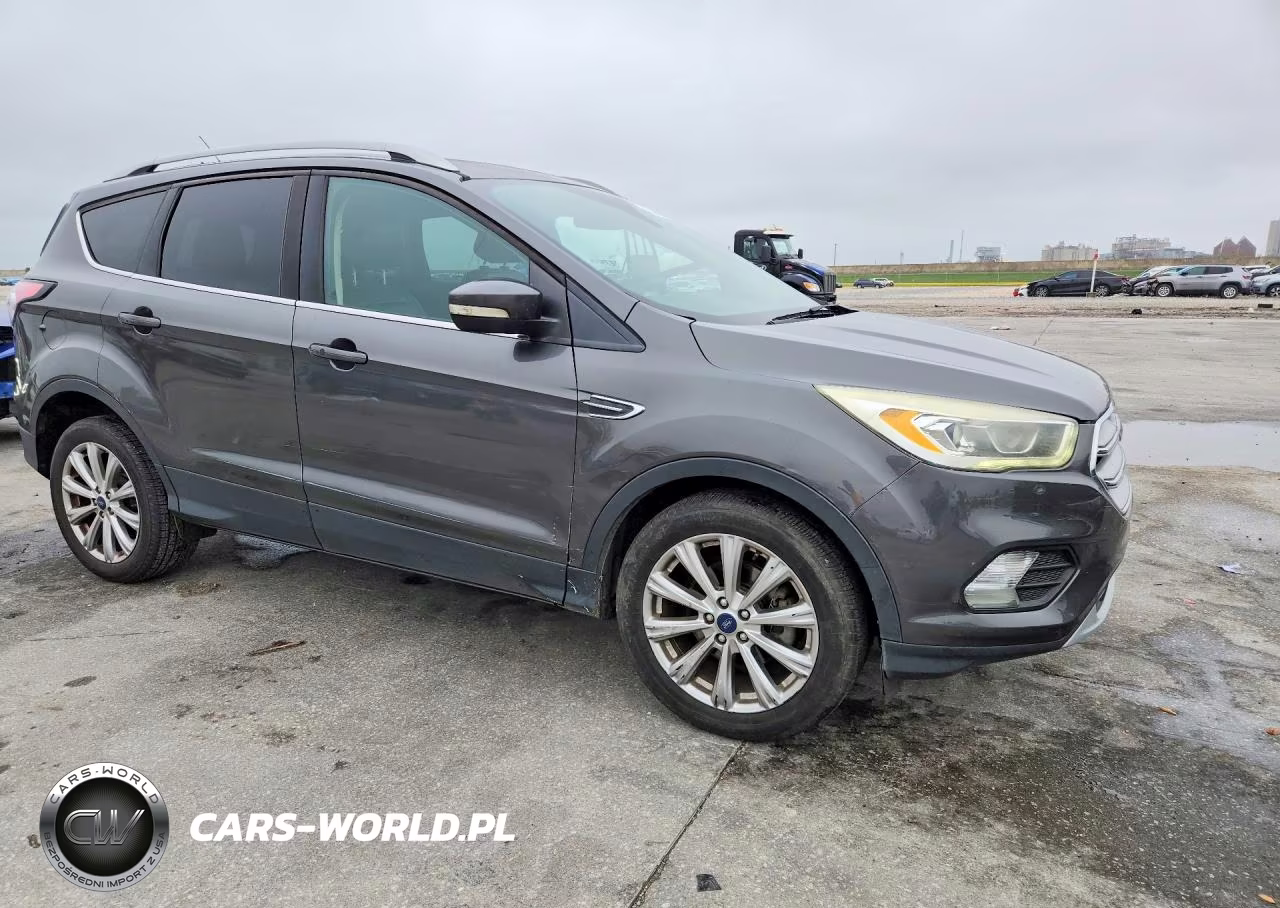 2017 Ford Escape Titanium VIN:1FMCU0JD1HUC94902 - 4