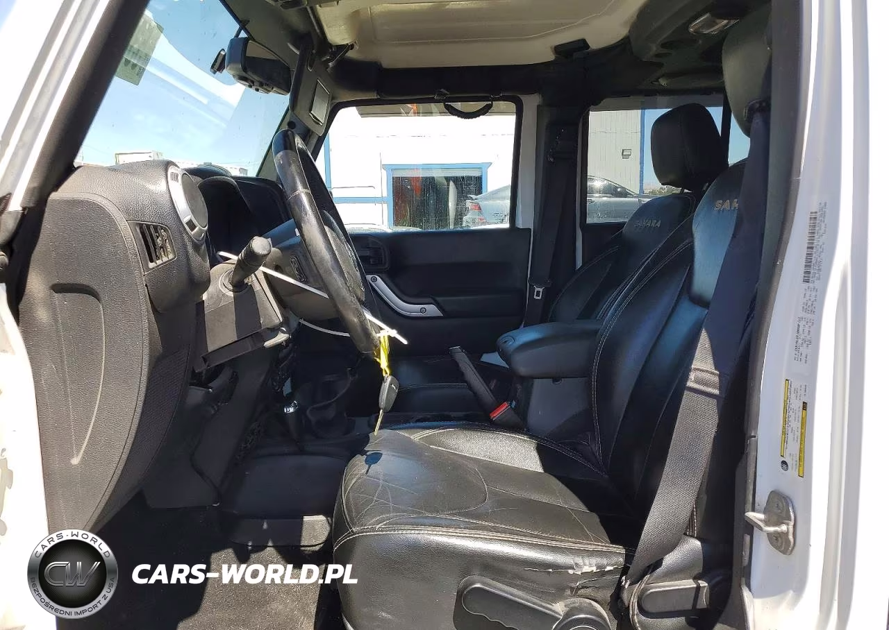 2014 Jeep Wrangler Unlimited Sahara VIN:1C4BJWEG3EL135543 - 7