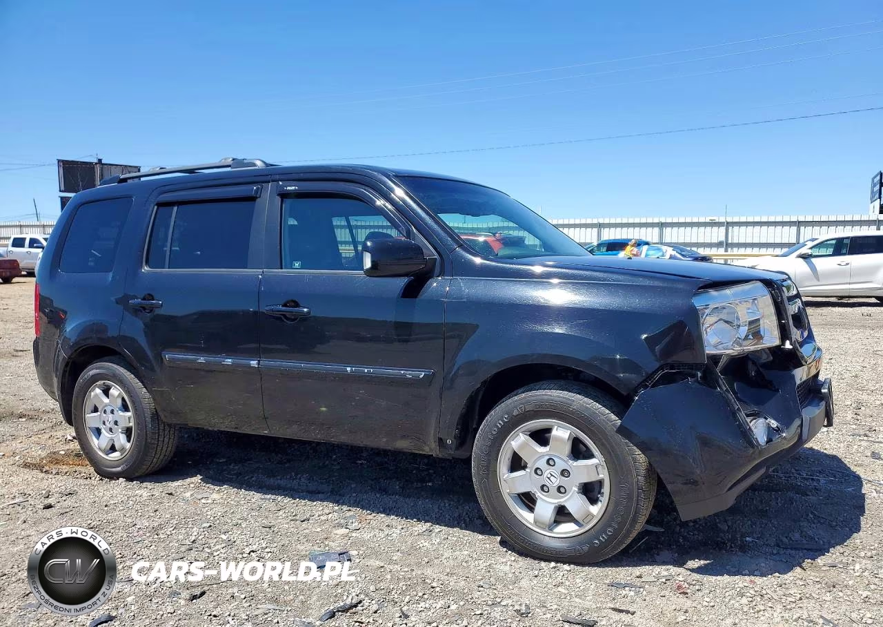 2010 Honda Pilot Touring VIN:5FNYF4H91AB029120 - 4
