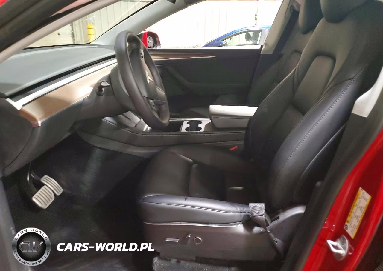 2023 Tesla Model Y VIN:7SAYGDEF5PF668104 - 7