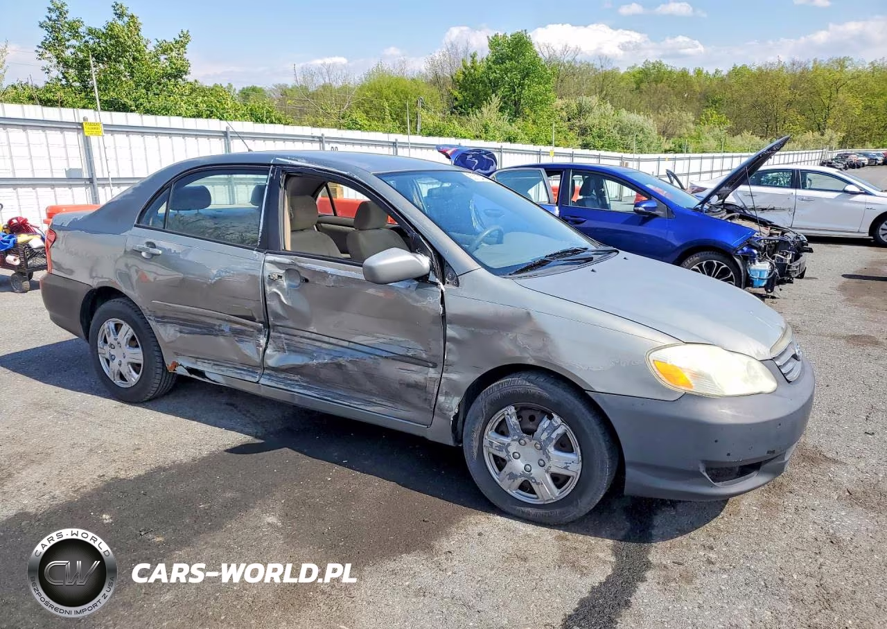 2003 Toyota Corolla Le VIN:JTDBR32E032000310 - 4