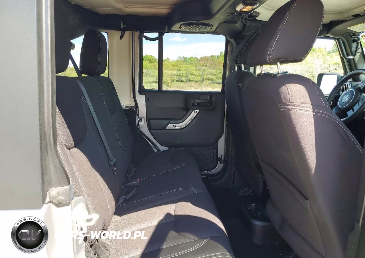 2014 Jeep Wrangler Unlimited Sahara VIN:1C4BJWEGXEL203451 - 10