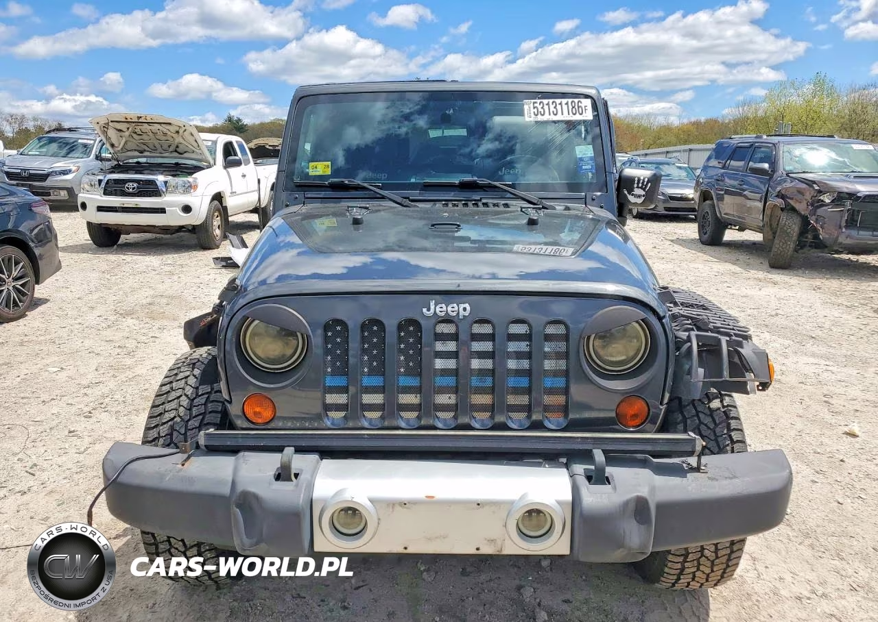 2010 Jeep Wrangler Unlimited Sahara VIN:1J4BA5H18AL156331 - 5
