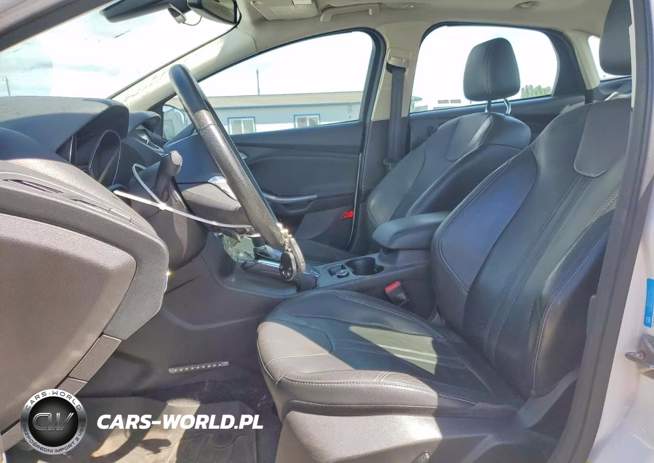 2012 Ford Focus Titanium VIN:1FAHP3J29CL189594 - 7