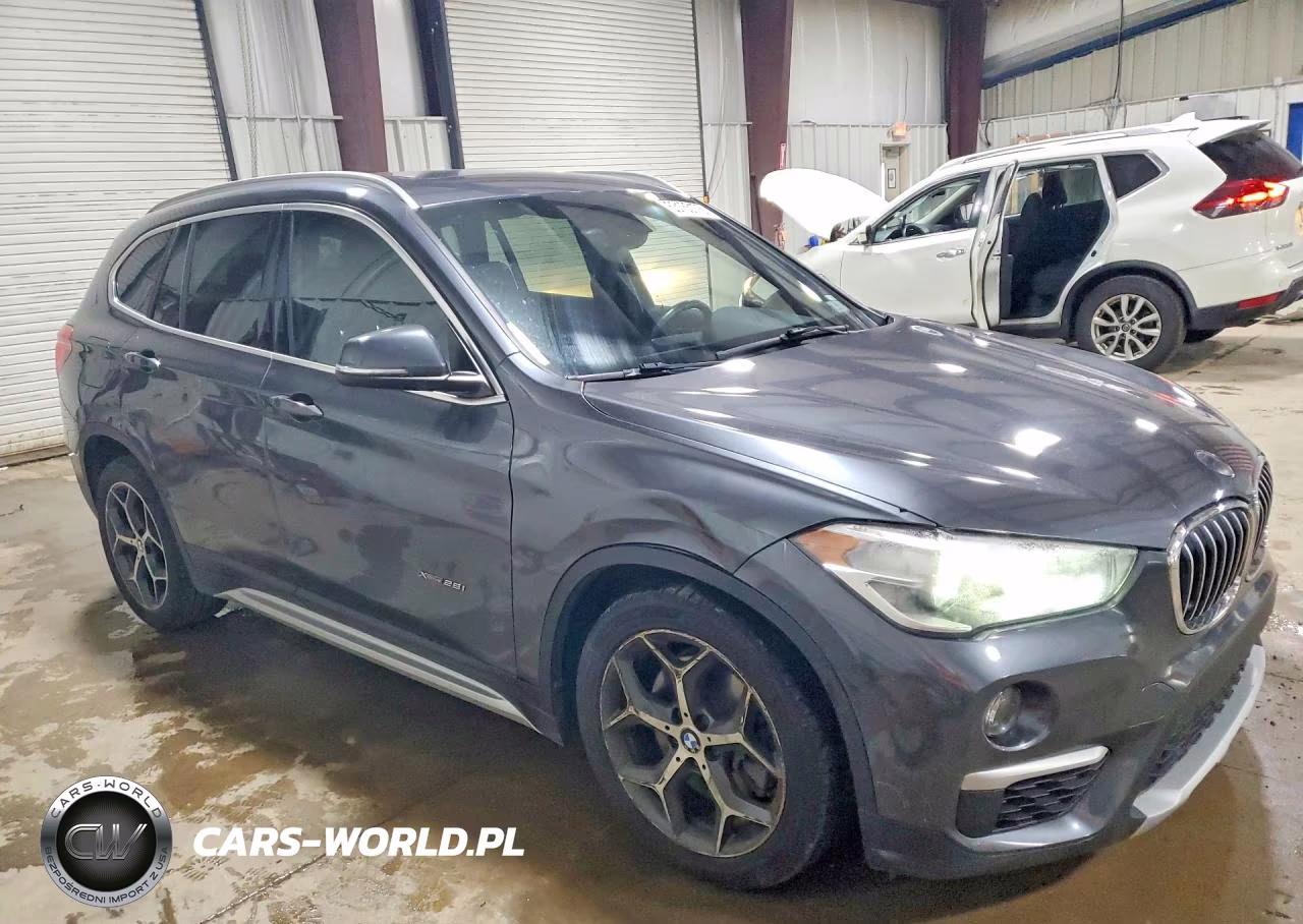 2018 BMW X1 xDrive28I VIN:WBXHT3C32J5K30941 - 4