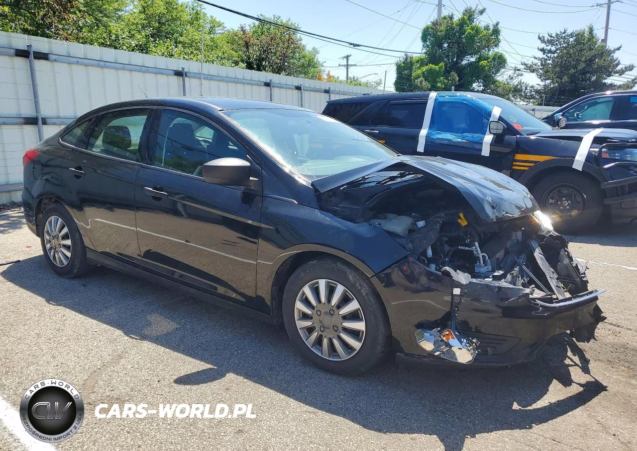 2017 Ford Focus S VIN:1FADP3E2XHL332097 - 4