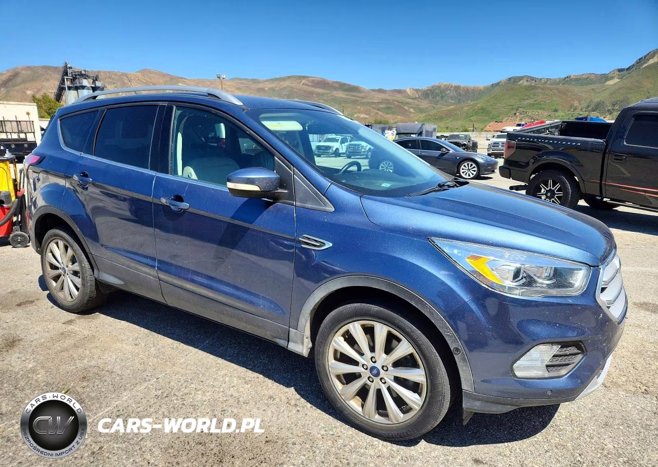 2018 Ford Escape Titanium VIN:1FMCU0J94JUC58543 - 4