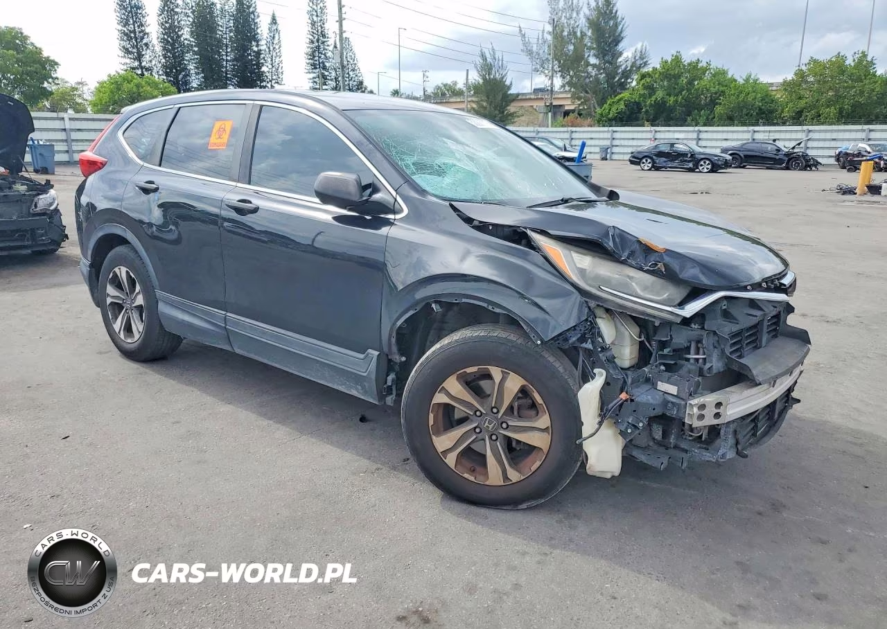 2019 Honda Cr-V Lx VIN:2HKRW5H30KH411812 - 4