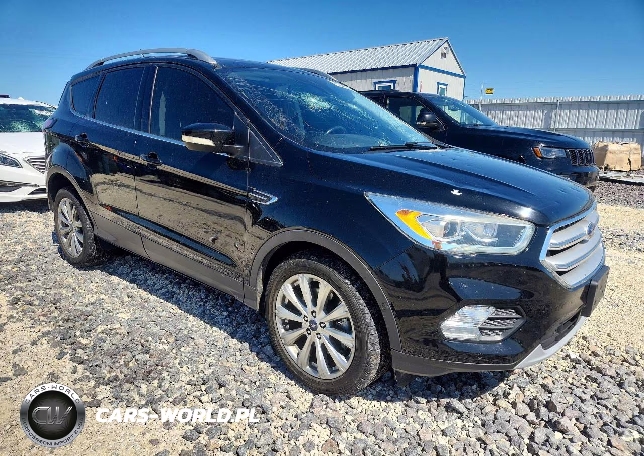 2018 Ford Escape Titanium VIN:1FMCU0J96JUA74673 - 4