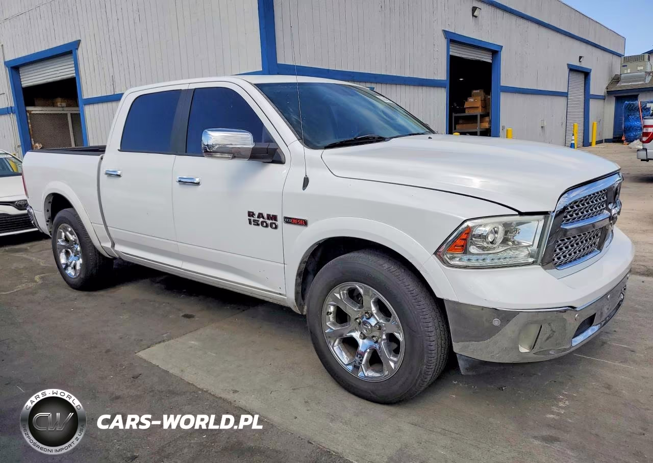 2015 Ram 1500 Laramie VIN:1C6RR6NM4FS590056 - 4