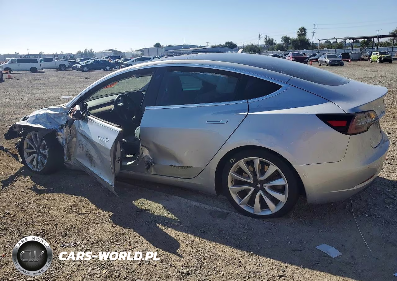 2018 Tesla Model 3 VIN:5YJ3E1EB2JF116947 - 2