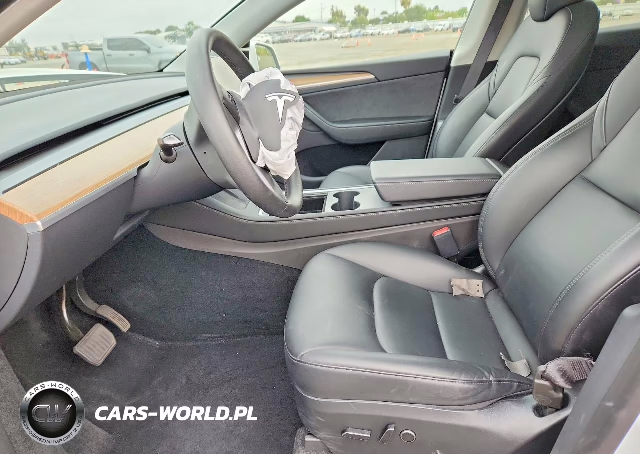 2023 Tesla Model Y VIN:7SAYGDEE3PA129047 - 7