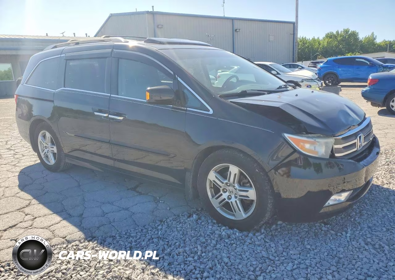 2012 Honda Odyssey Touring VIN:5FNRL5H96CB128473 - 4