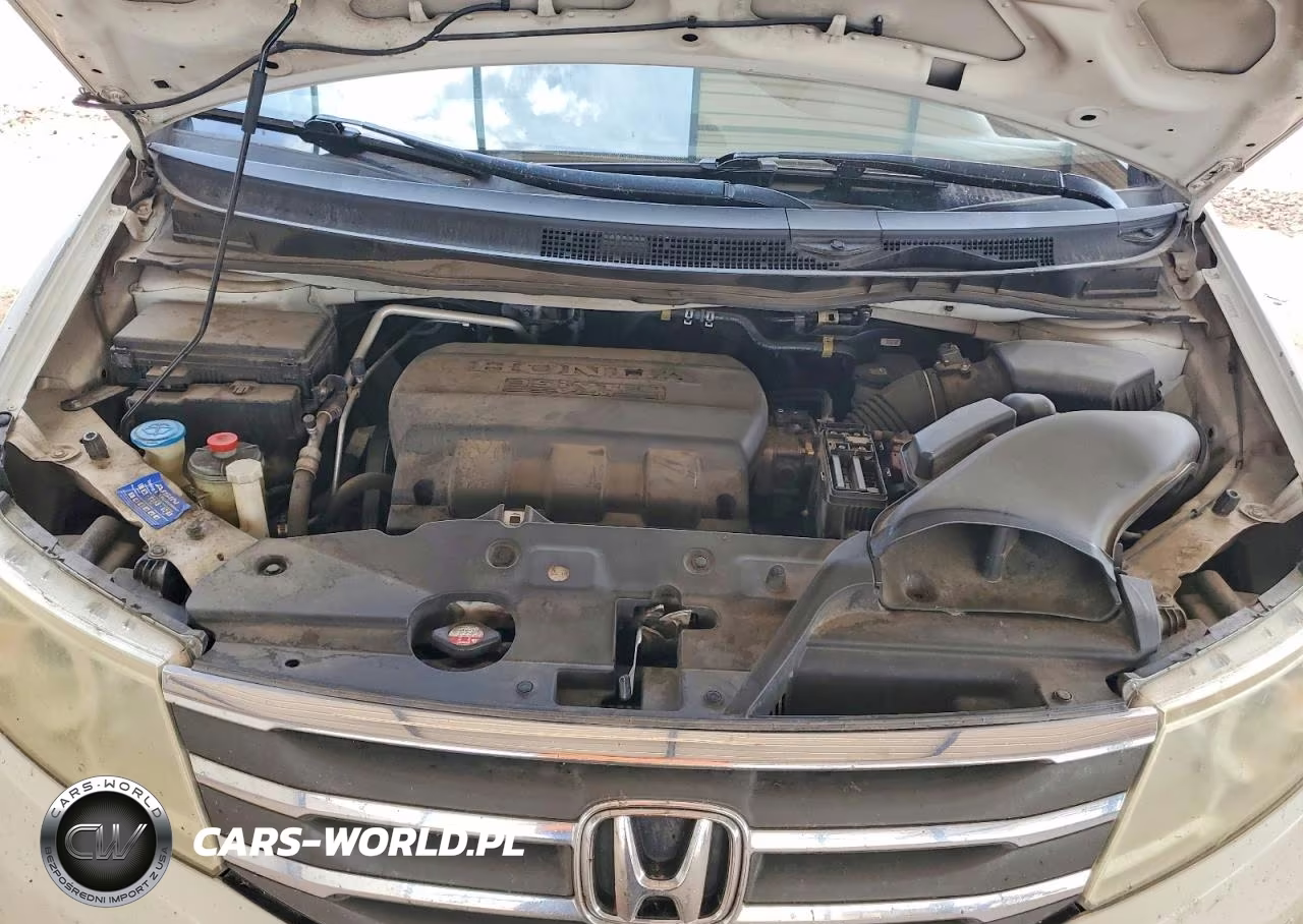 2012 Honda Odyssey Touring VIN:5FNRL5H94CB046564 - 11