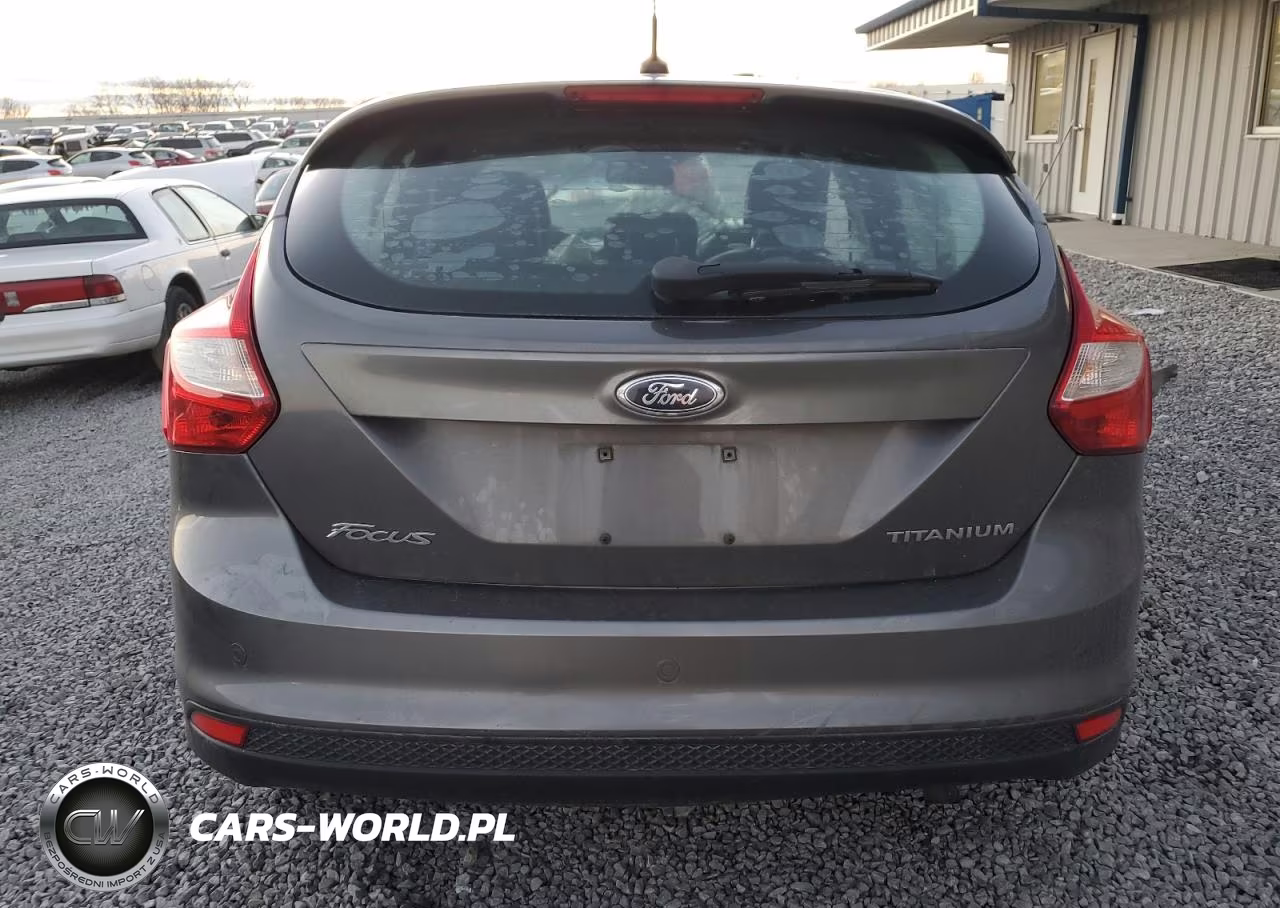 2012 Ford Focus Titanium VIN:1FAHP3N29CL213841 - 6