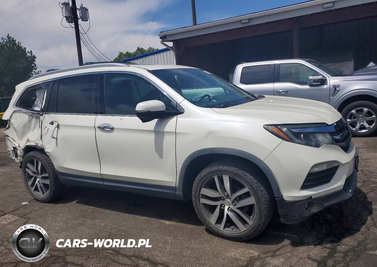 2017 Honda Pilot Touring VIN:5FNYF6H97HB085911 - 4