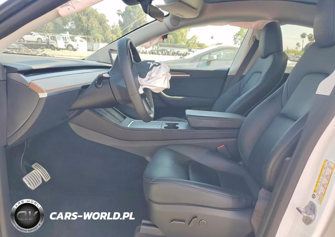 2023 Tesla Model Y VIN:7SAYGDEF8PF924297 - 7