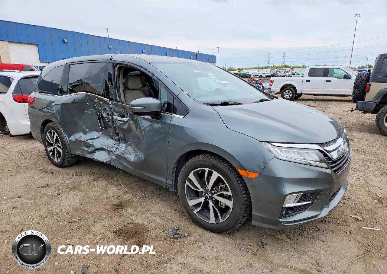 2018 Honda Odyssey Elite VIN:5FNRL6H94JB091877 - 4